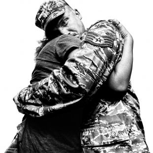 Returning Airman with his loved one